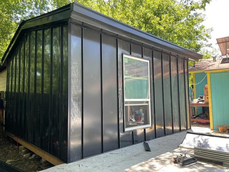 Black standing seam metal wall panels for Metal Roof Installation in Sandpoint