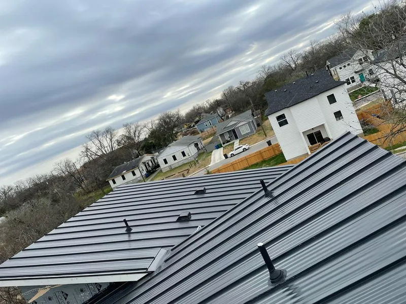 Standing seam metal roof panels with vents for Skylight Repair in Sandpoint